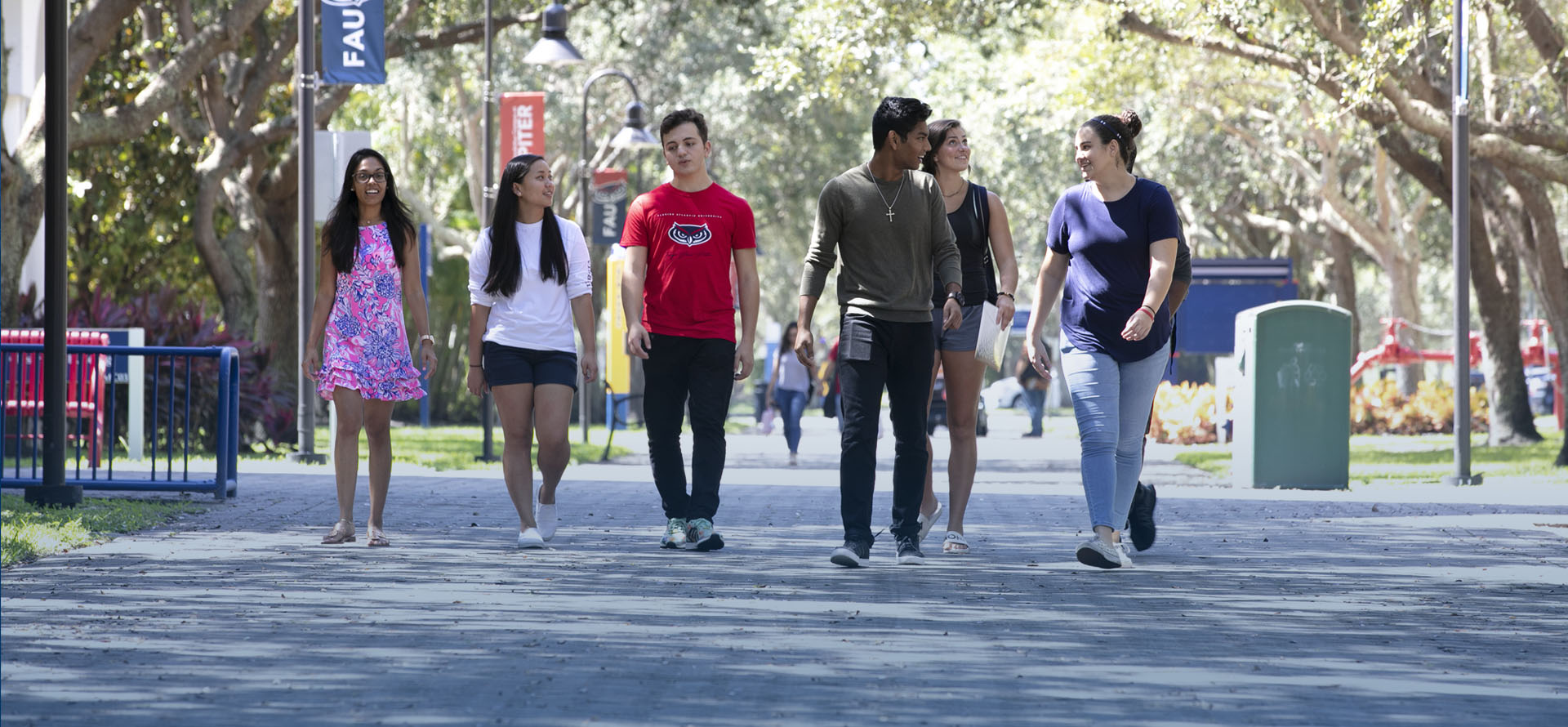 students walking the sidewalk